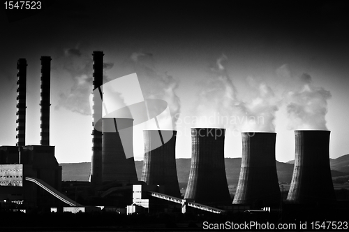 Image of Fumes coming out of power plant