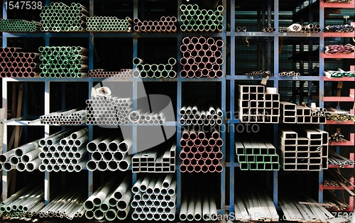 Image of Pipes stacked up in a factory 
