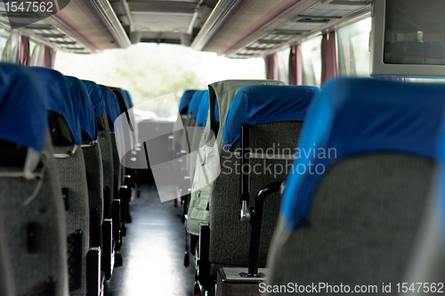 Image of Interior of a bus with many seats