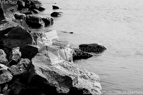 Image of Tranquil scene ath the sohres of an ocean 