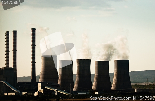 Image of Fumes coming out of power plant