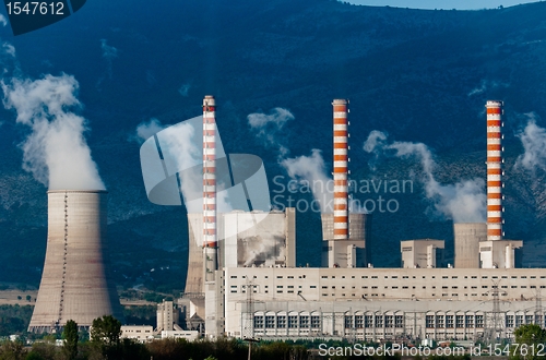 Image of Fumes coming out of power plant