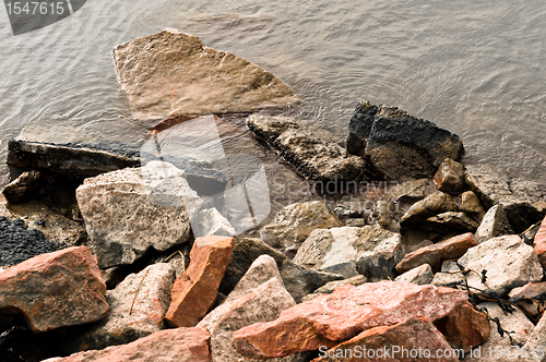 Image of Tranquil scene ath the sohres of an ocean