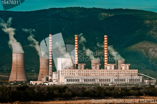 Image of Fumes coming out of power plant