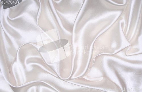 Image of Smooth elegant white silk as background 