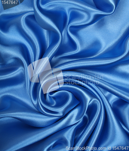 Image of Smooth elegant blue silk as background 