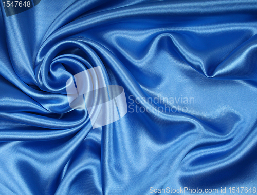 Image of Smooth elegant blue silk as background 