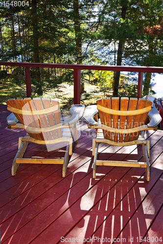 Image of Forest cottage deck and chairs