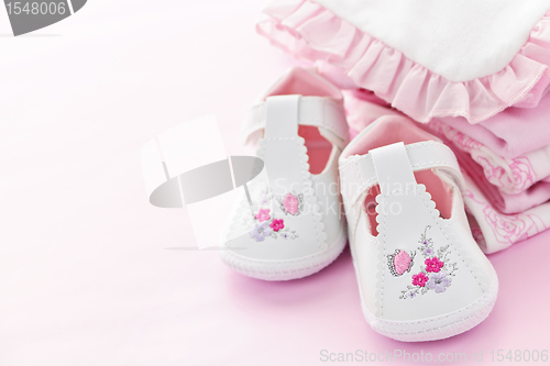 Image of Pink baby clothes for infant girl