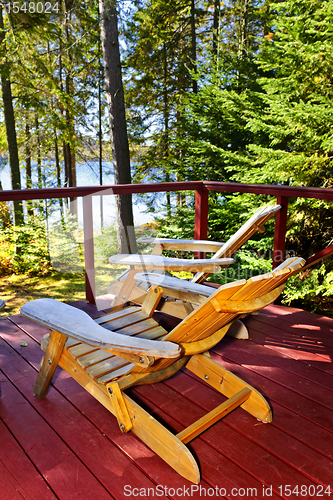 Image of Forest cottage deck and chairs