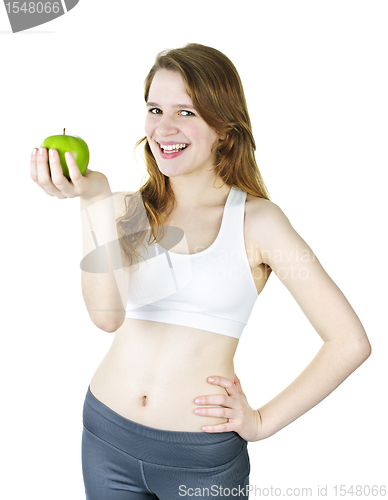 Image of Young smiling girl holding apple