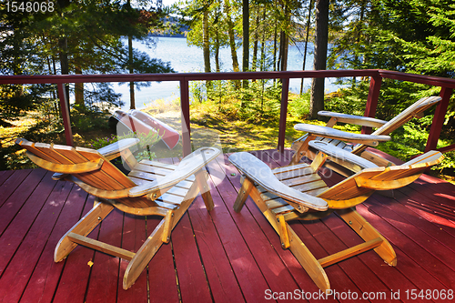 Image of Forest cottage deck and chairs