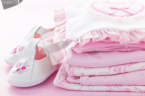 Image of Pink baby clothes for infant girl