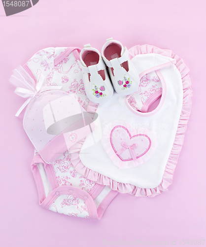 Image of Pink baby clothes for infant girl