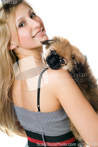 Image of Portrait of woman and puppy