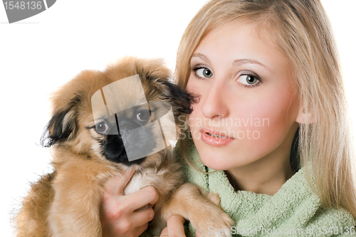 Image of Pretty woman with a pekinese