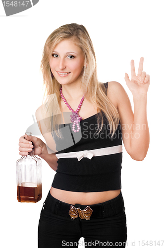 Image of Young woman posing with a bottle