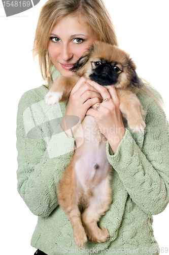 Image of Young woman with a pekinese