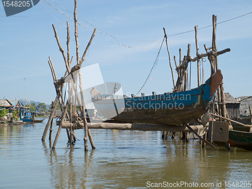 Image of Boat repair shop at floating village on Tonle Sap