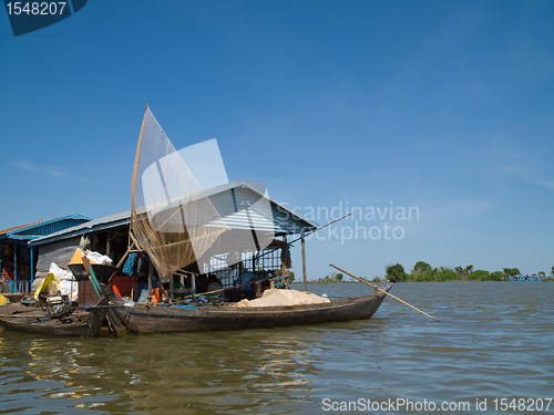 Image of Fishing boat at floating village on Tonle Sap, Cambodia