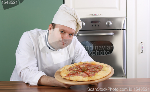 Image of Chef and pizza