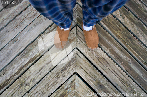 Image of Slippers On The Deck