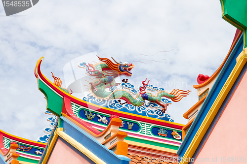 Image of Colorful Chinese Dragon Sculpture on Temple Roof