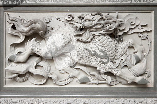 Image of Stone Carving of Qilin on Chinese Temple Wall