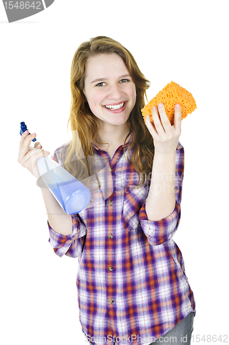 Image of Smiling girl with cleaning supplies
