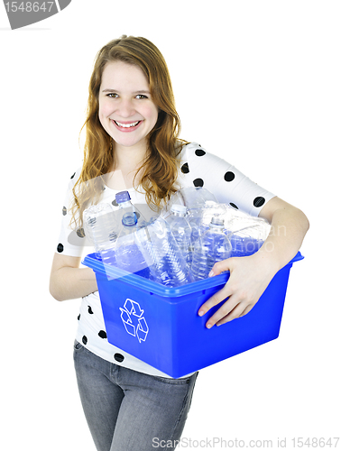 Image of Young woman holding recycling box