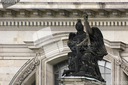 Image of Berlin Cathedral with black sculpture