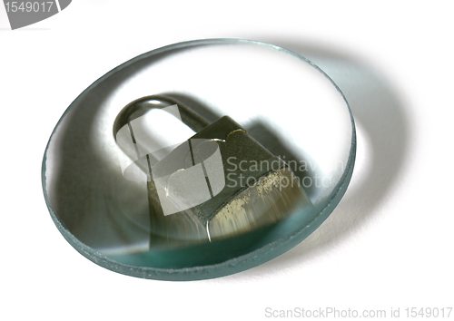 Image of padlock under optical lens