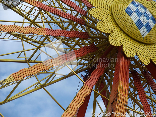 Image of detail of a colorful big wheel