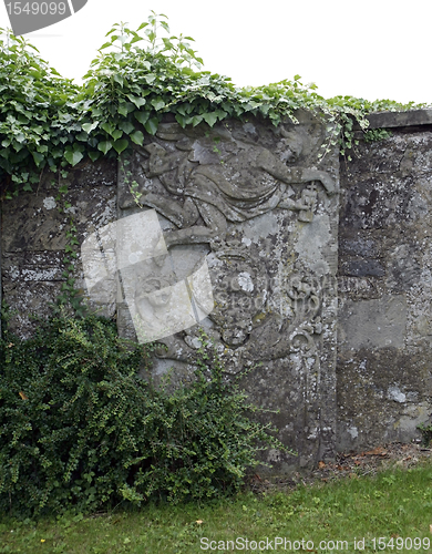 Image of old stone relief on a wall