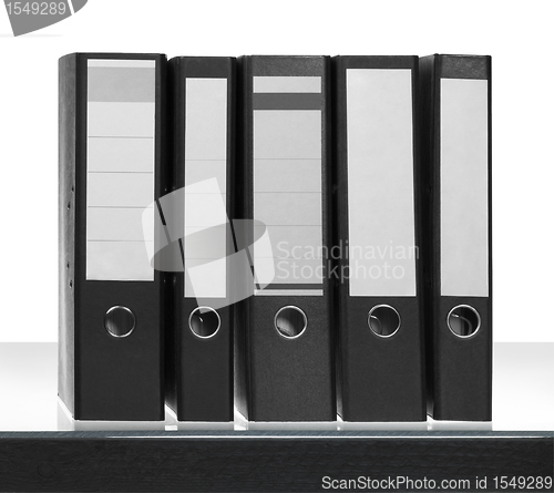Image of folders on desk surface