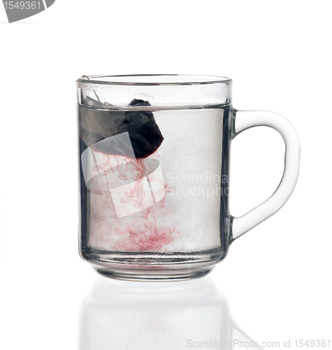 Image of glass teacup with tea bag