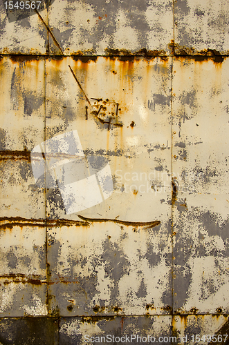 Image of Rusty tin house wall closeup  vintage background 