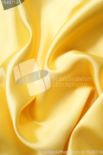 Image of Smooth elegant golden silk can use as background 