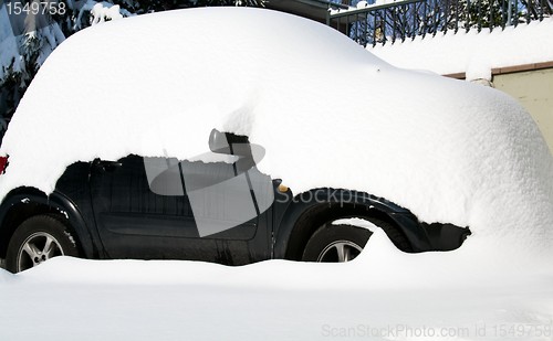 Image of Car hidden in snow