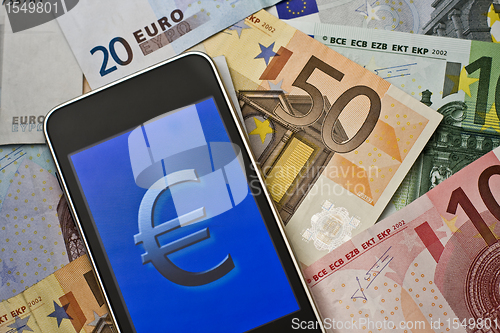 Image of euro symbol on handheld