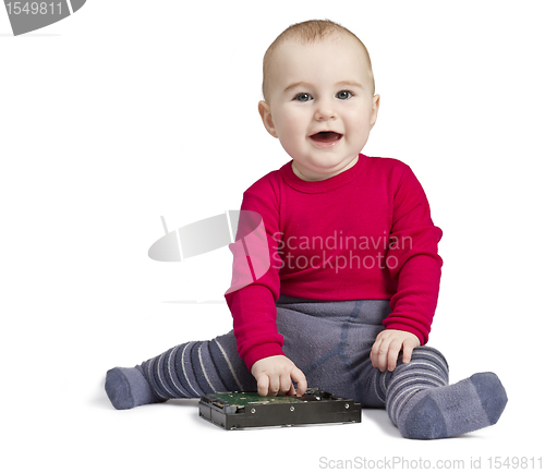 Image of young child in white background with hard drive