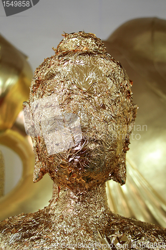 Image of Head of golden Buddha