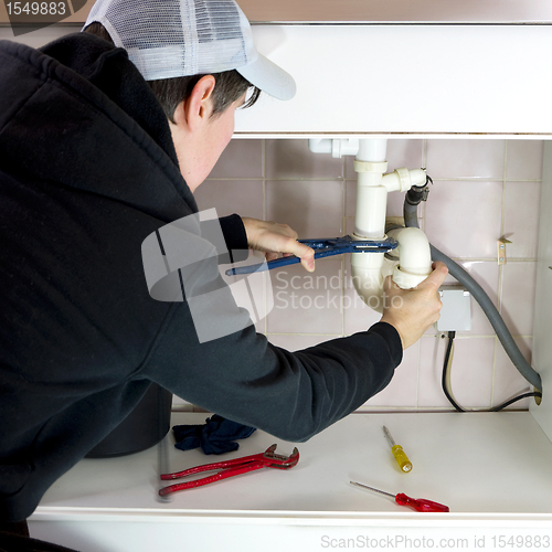 Image of plumber repairman