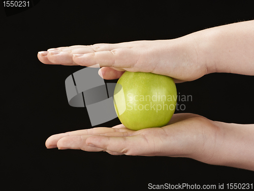Image of Childs hands with apple