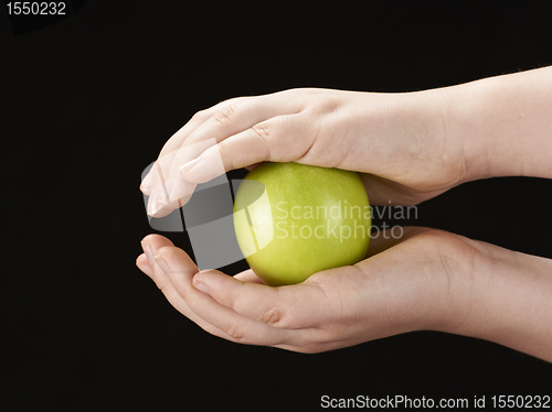 Image of Childs hands with apple
