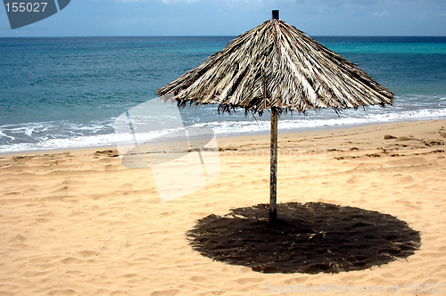 Image of beach of sand with sun