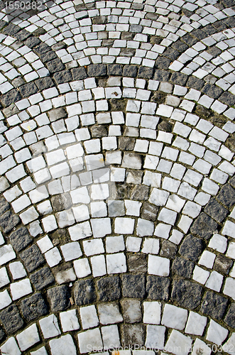 Image of Ancient ceramic tiled decorative stone walkway 