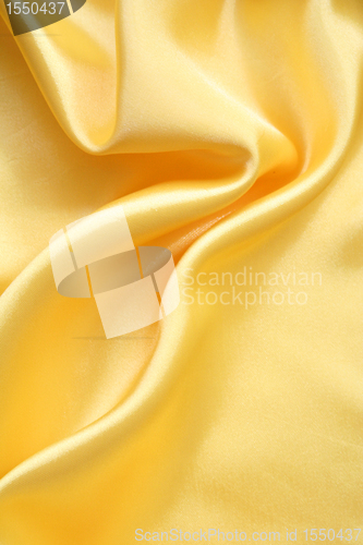 Image of Smooth elegant golden silk can use as background 