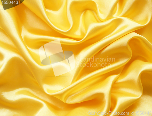 Image of Smooth elegant golden silk can use as background 