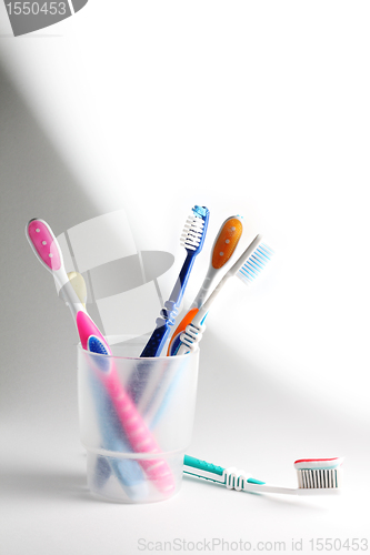 Image of Toothbrushes in a glass